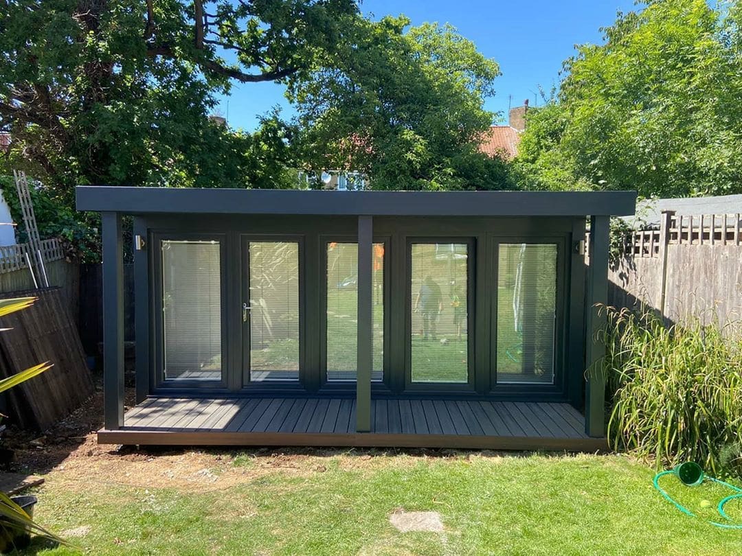 QCB5 Retreat — garden office with flyover roof and decking
