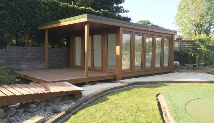 Close up of garden studio overlooking a pond