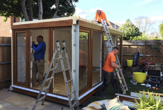 Well oiled machine with 3 fitters installing a QCB garden office