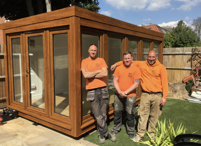 Pix, Dan and Steve in front of the newly installed 16' x 8' QCB garden office