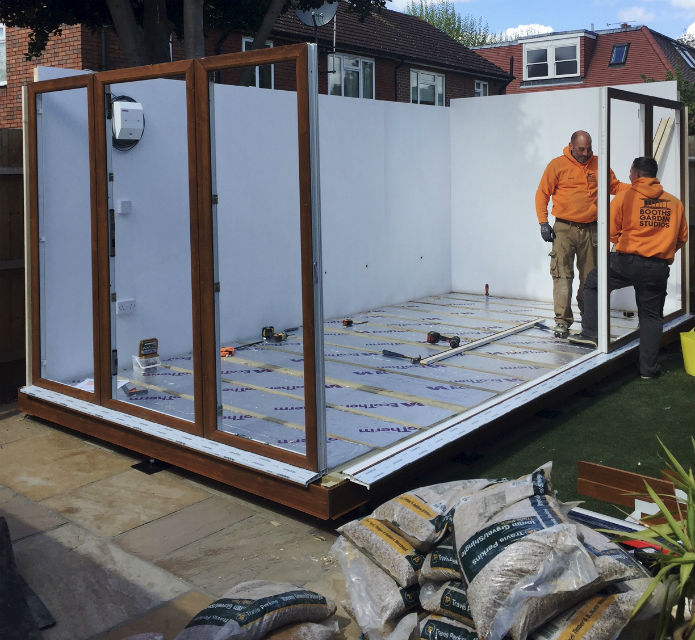 garden office showing the consumer unit on the rear garden office wall