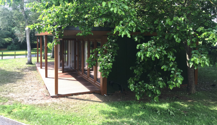 School building library set in trees and supplied by Booths Garden Studios