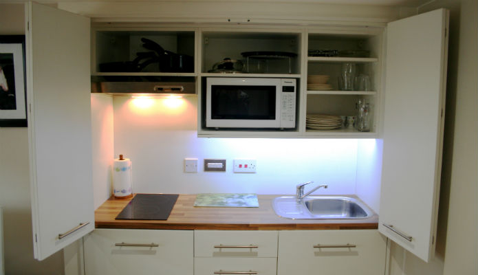 Close up of compact hidden Kitchen in granny annexe