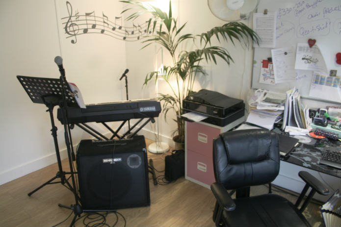 Singing teacher in garden office