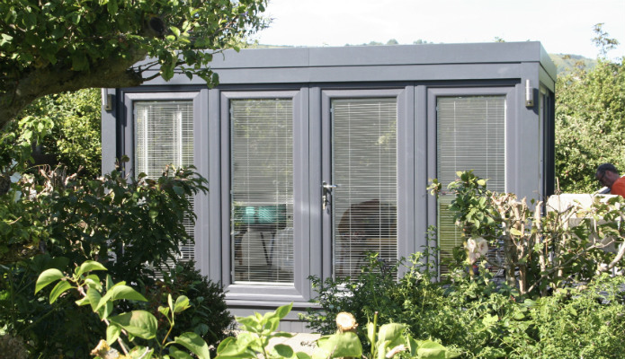 Close up of the 12' x 8' garden studio being used as a summerhouse 