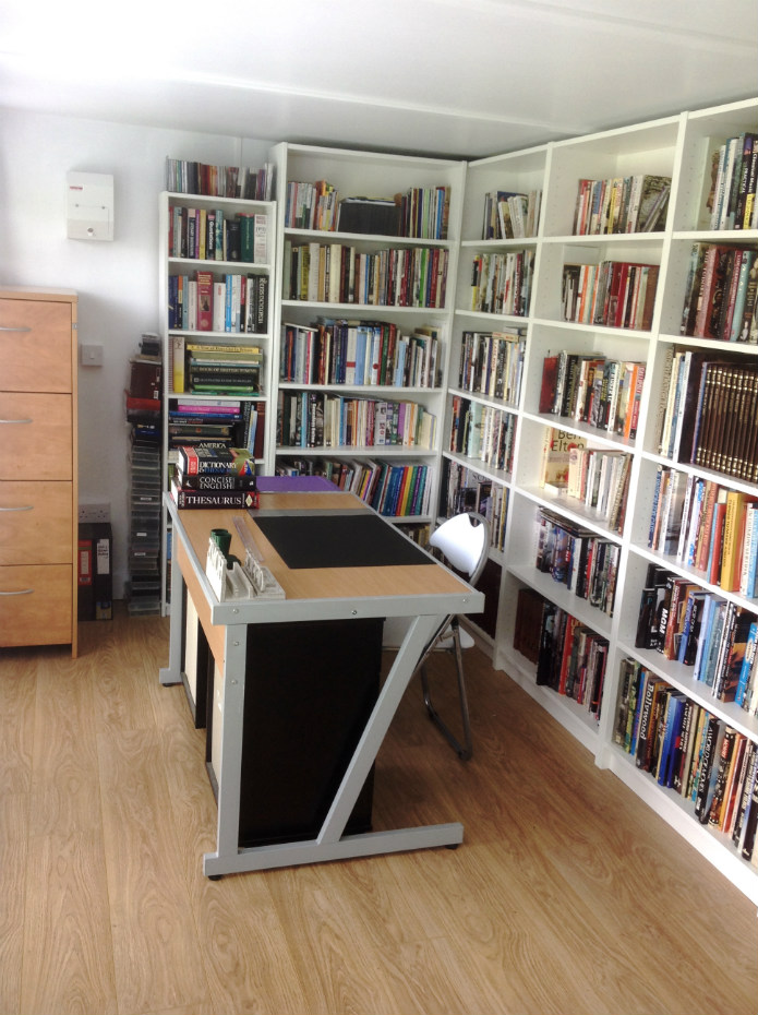 Library within an insulated garden pod from Booths Garden Studios